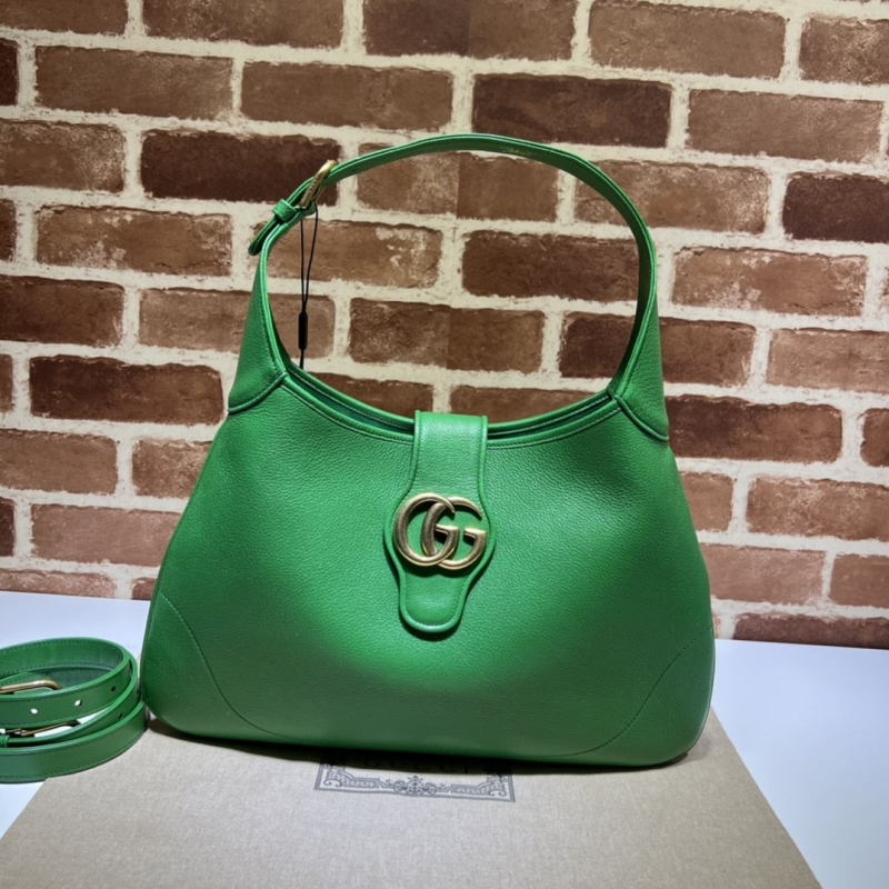 G*u*i top handle bags